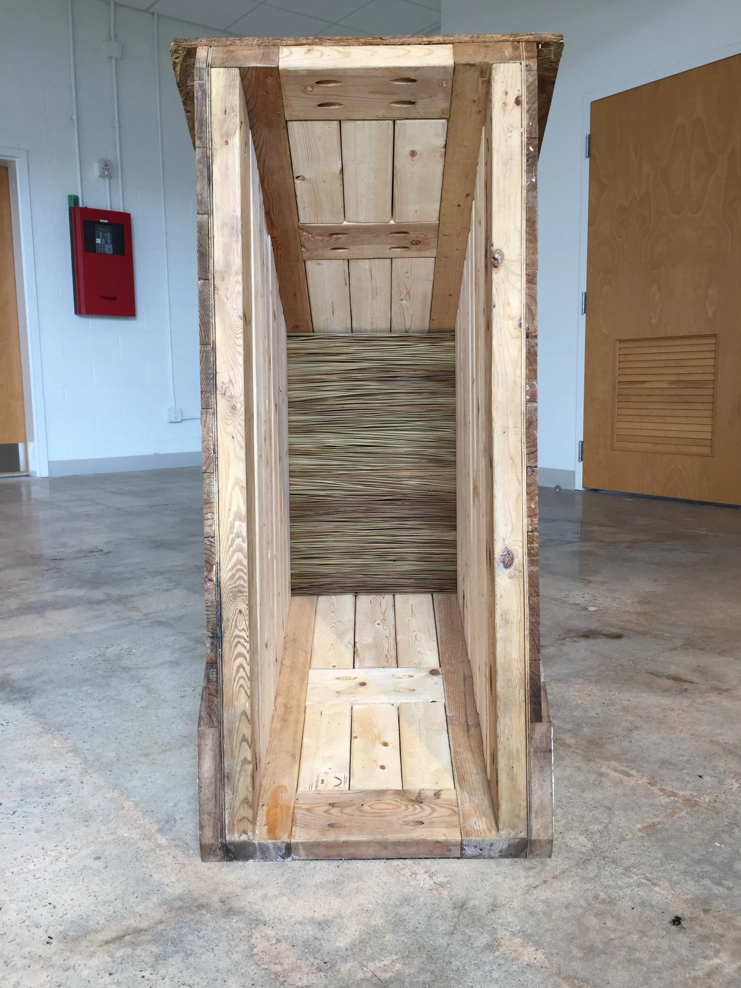    Revisiting a Place Overlooked, 2017    Reclaimed Wood, Plywood, Roofing Shingle, Bulrush (Marshland Grass) 77 x 44 x 21 in 