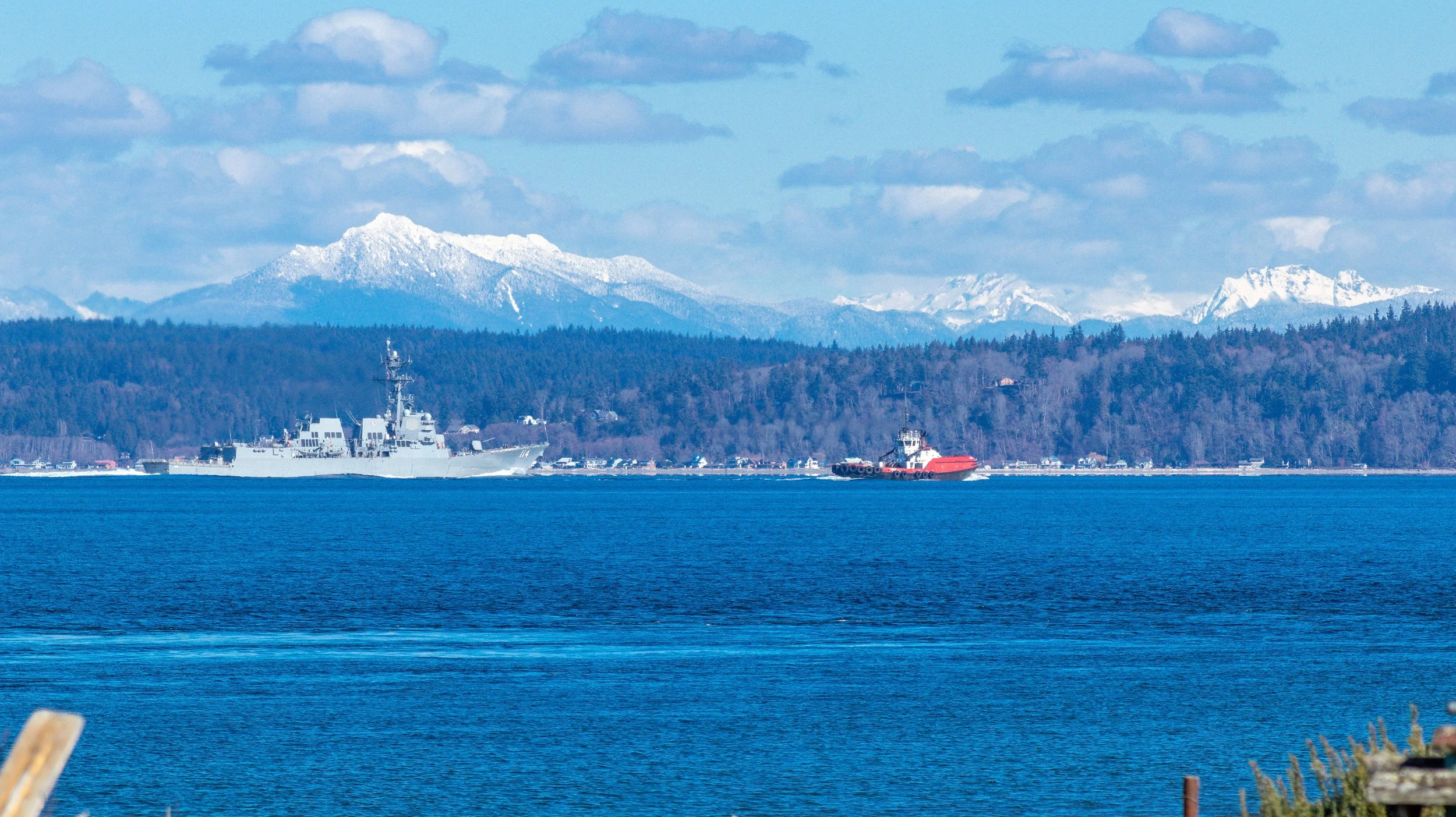 USS Ralph Johnson (DDG-114) on the Puget Sound with the Cascades in the background