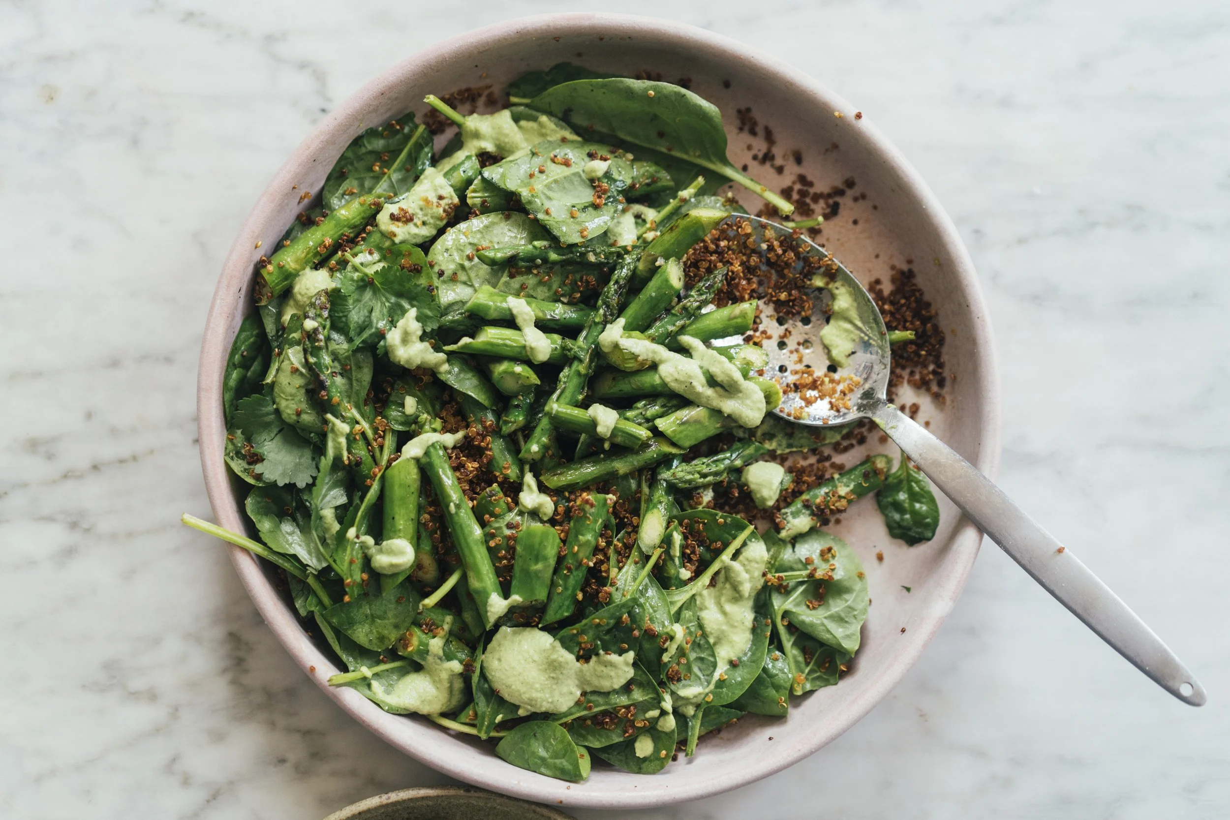Crispy quinoa and asparagus salad with coriander cashew cream