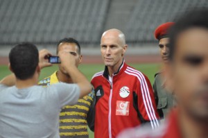 "Captain Bob" poses with some fans after training