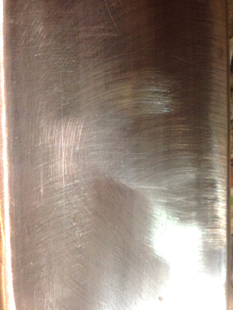 Tubular steel wire brushed clear of scale and rust