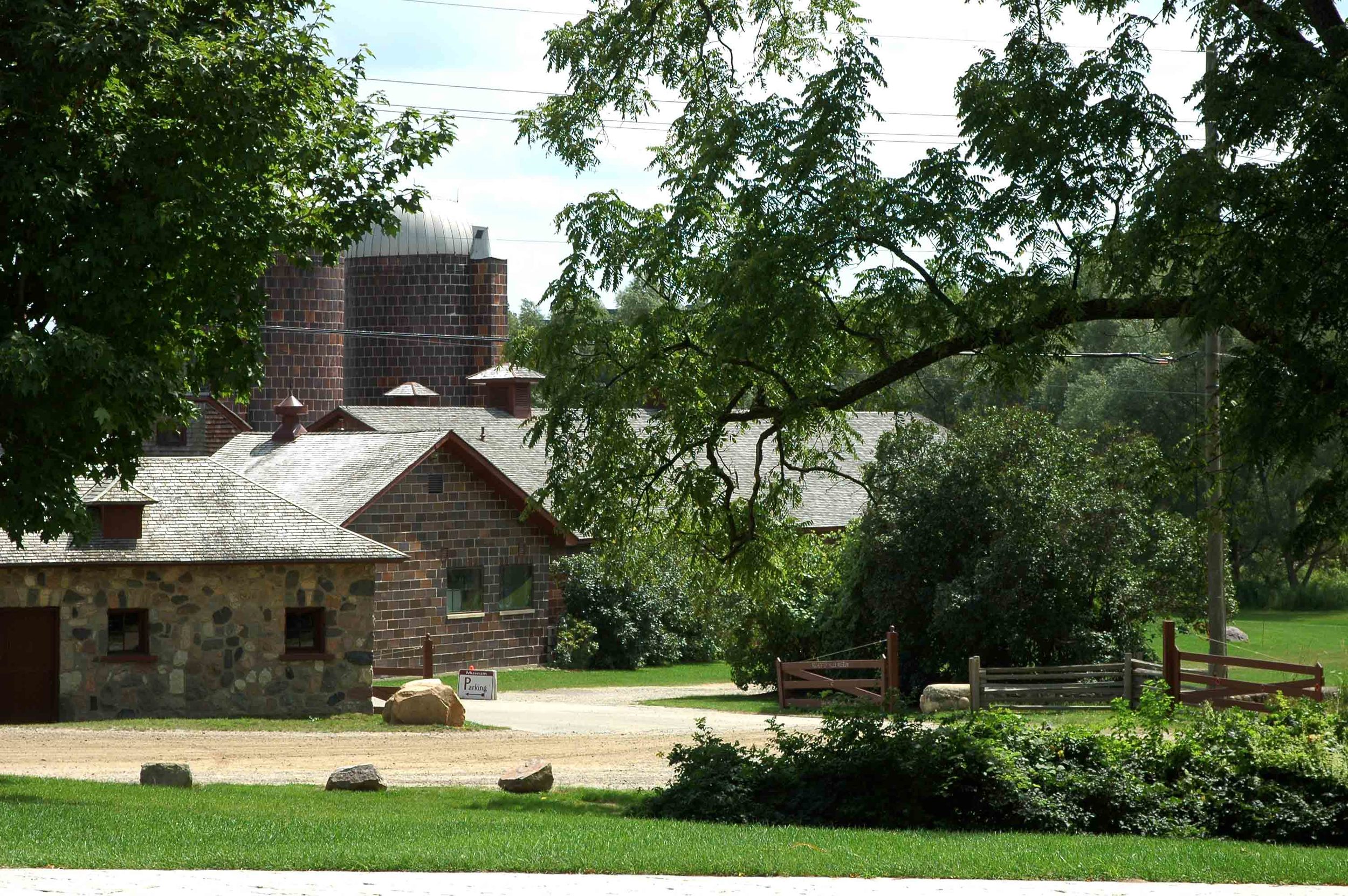 Milk House and Barn from the front yard.