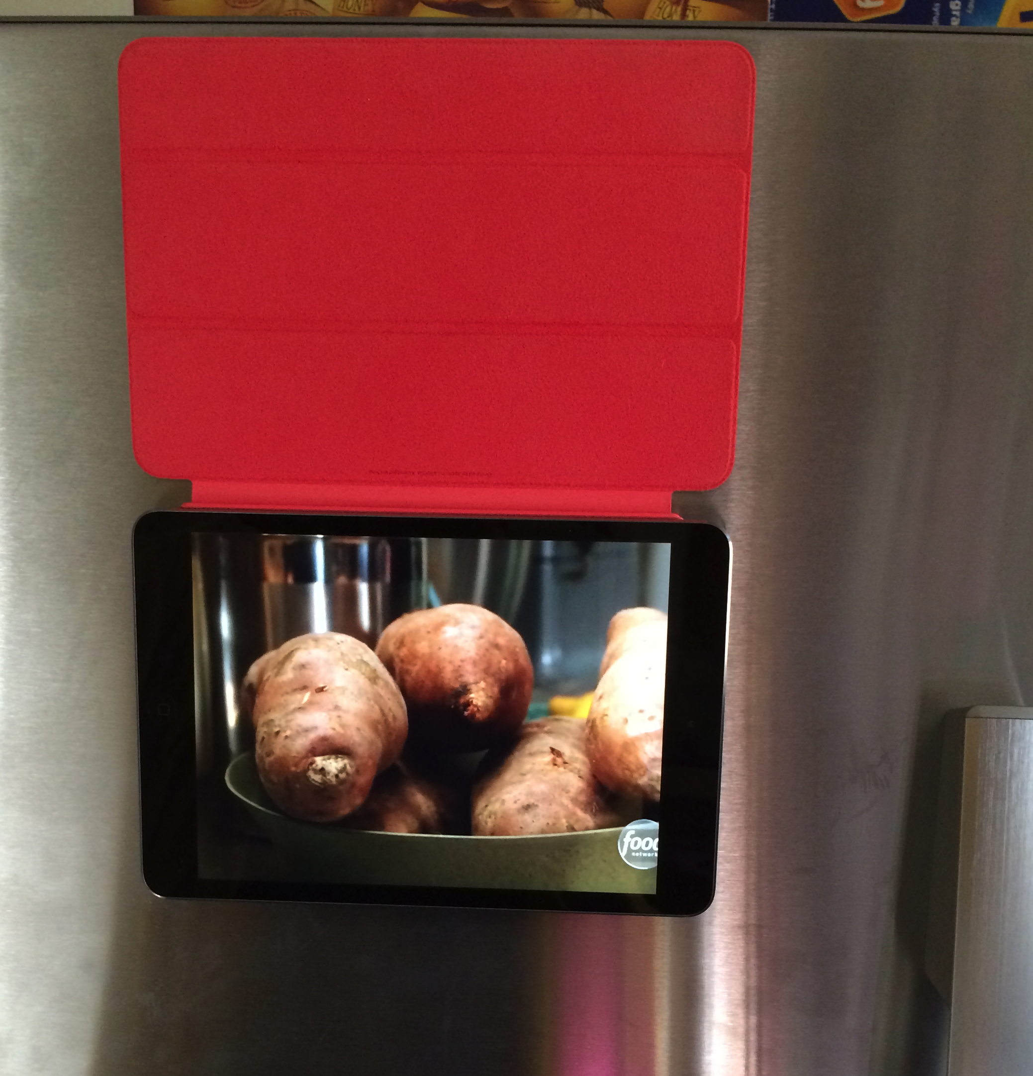 iPad mini with Retina display, Smart Cover, and DISH Anywhere makes a great fridge magnet TV. Click to enlarge.