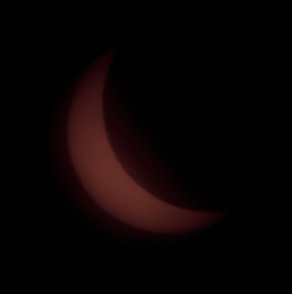 Fuzzy image of the sun due to heavy clouds in the region of Columbia, Missouri. FYI - the sun appears orange in these images due to the darkness of the solar filters used on the camera lens.