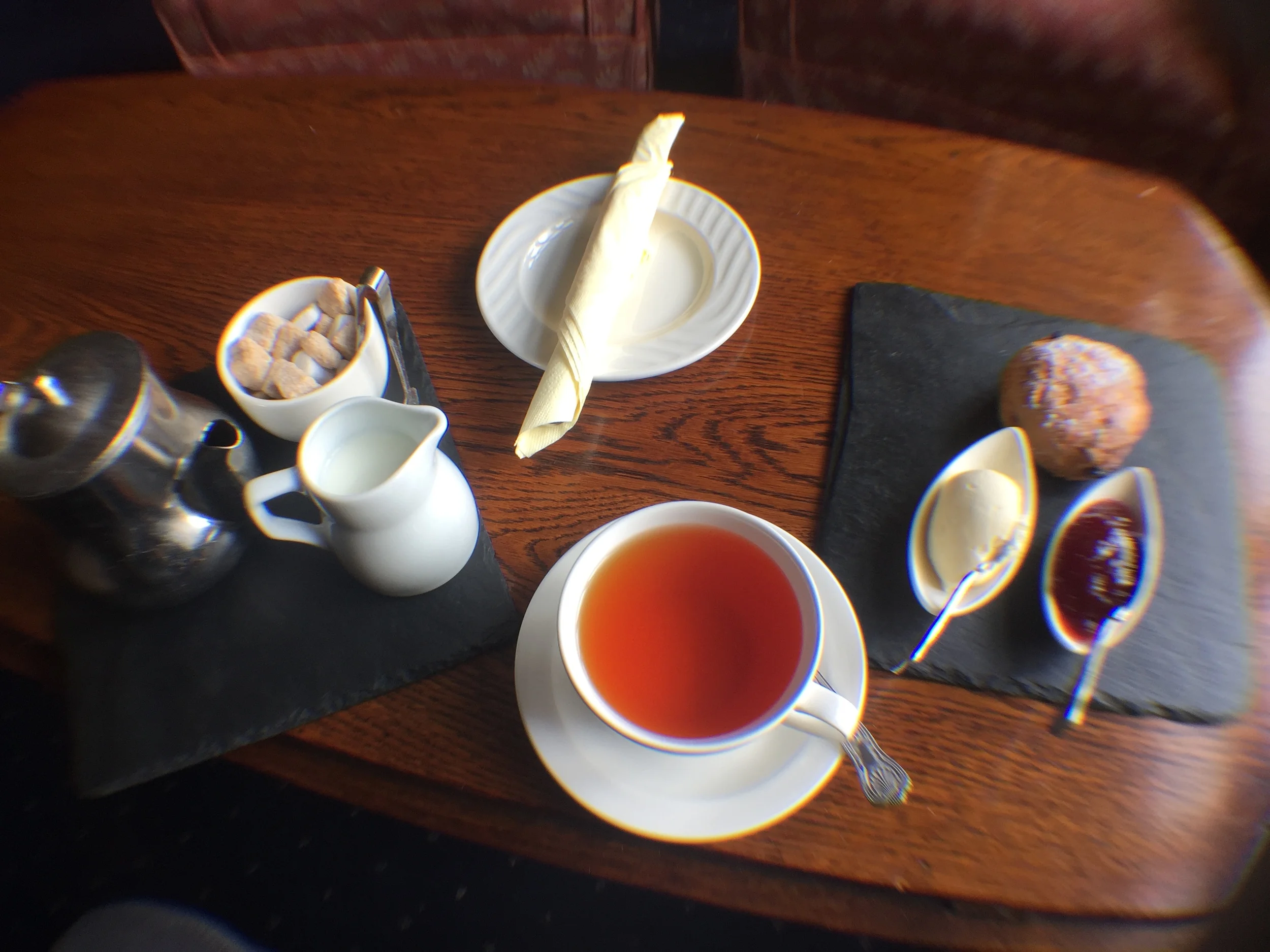 Having tea at in the Lake District. There's only one scone but you can bet I slathered all the clotted cream on it.
