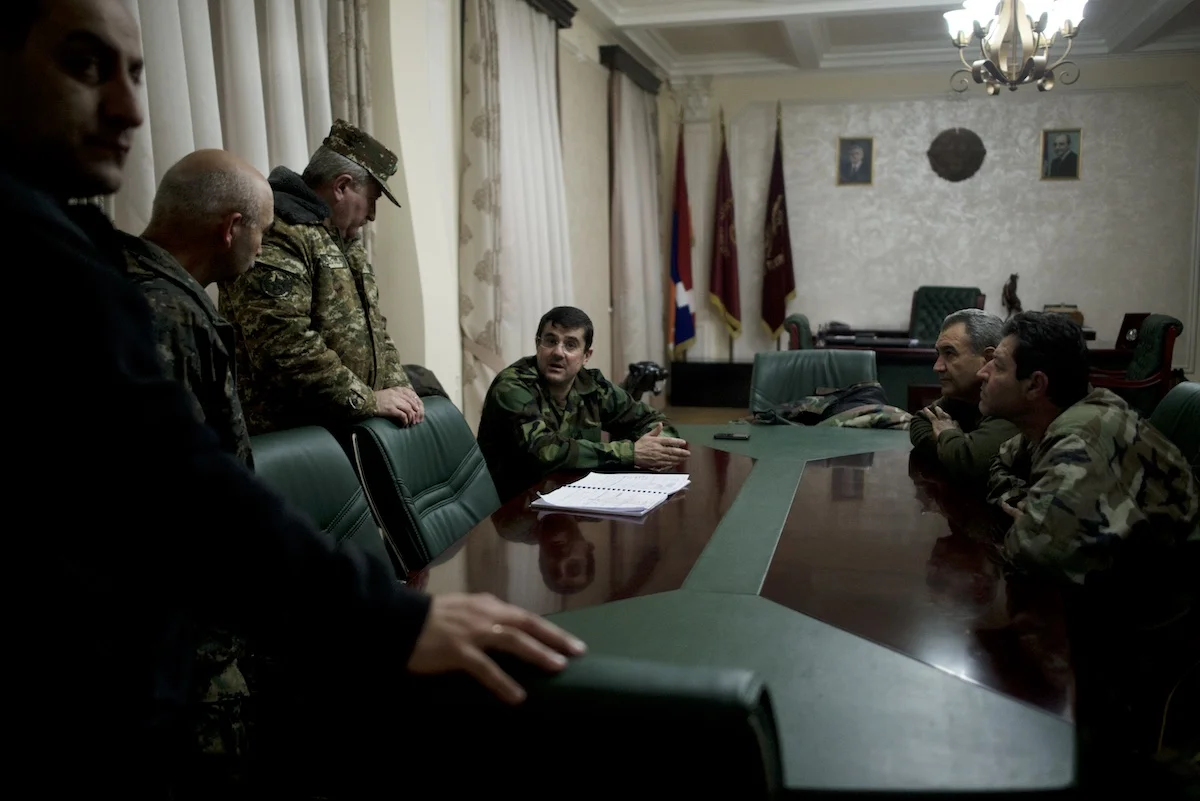 Nagorno Karabakh Prime Minister Arayik Harutyunyan is in discussions with his team, ahead of a meeting with volunteer fighters arriving to Stepanakert from different locations in Karabakh and Armenia.
