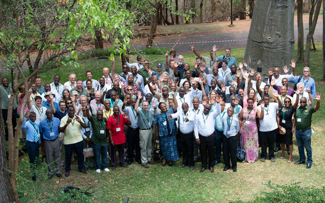 Workshop participants wave for the camera.