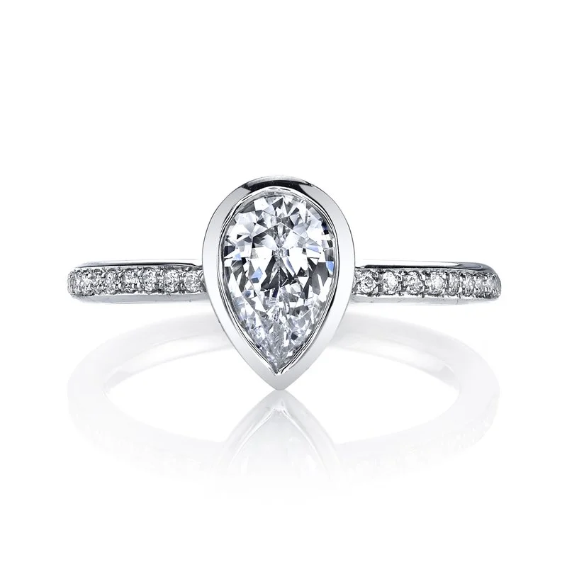 bezel set pear diamond ring