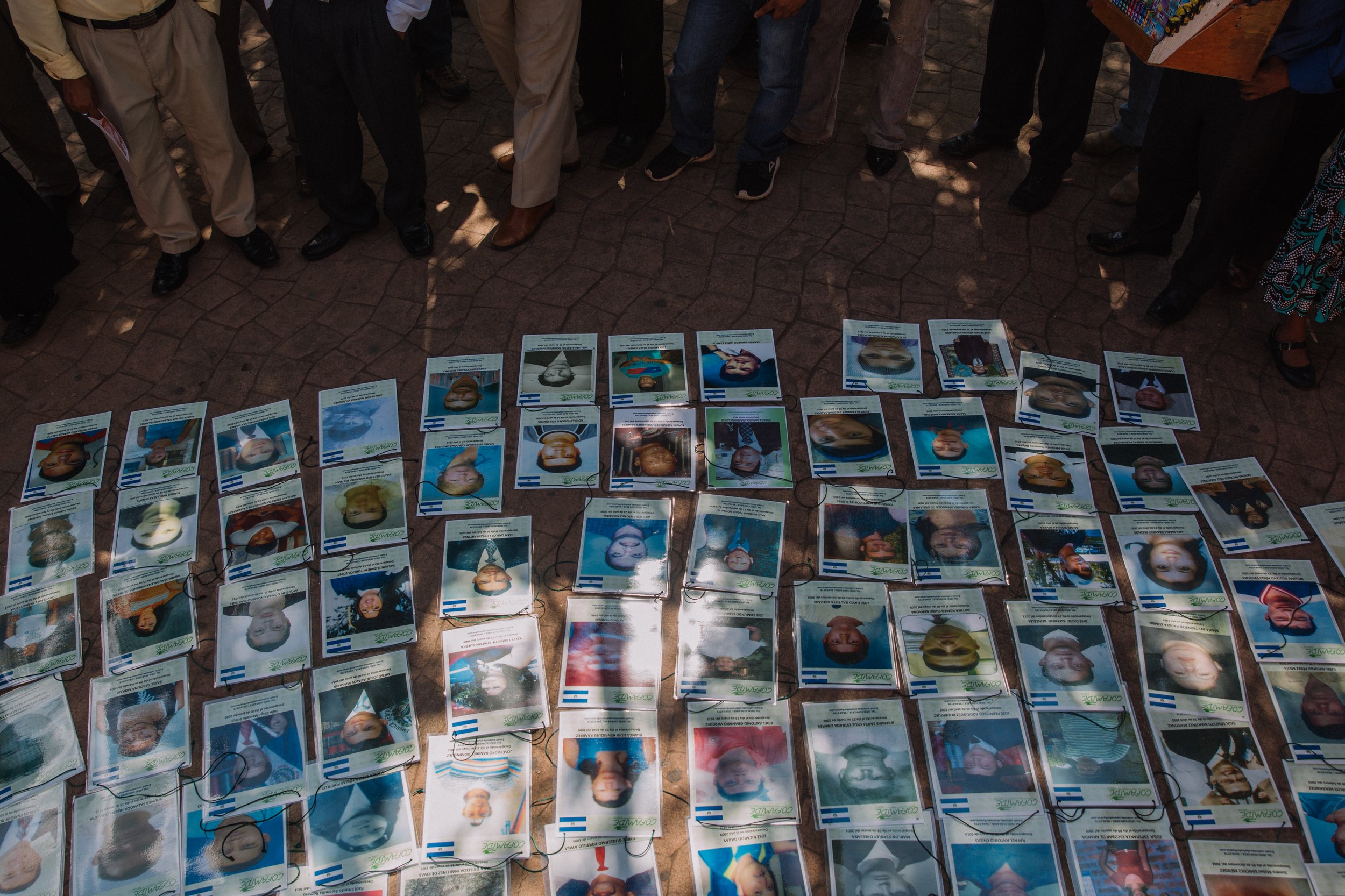  A crowd gathers in the town plaza of Chiapas, Mexico, to gaze upon the photos of missing migrants. For the Movimiento Migrante Mesoamericano, public exposure of these photos is crucial in the search for answers and justice. Press conferences and mar