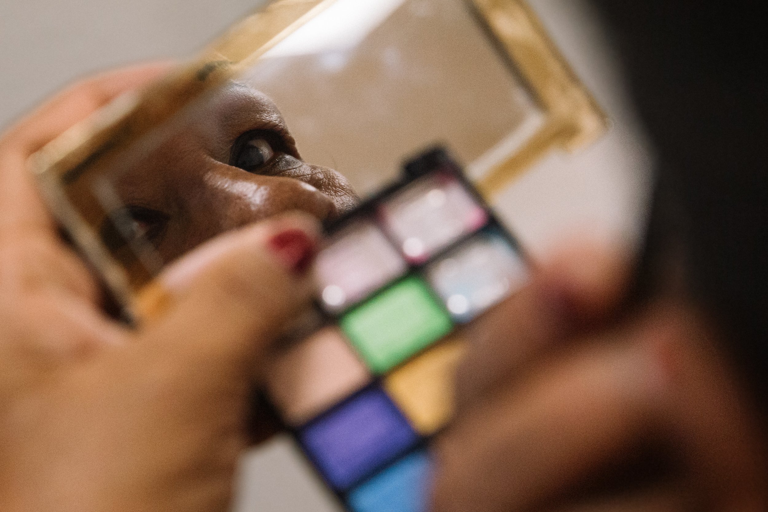  Martha Isabel Martinez from Honduras applies her makeup with a sense of purpose and determination, preparing to join the rest of the Caravana de Madres de Migrantes Desaparecidos for breakfast in Mexico City. Despite the passing of three long years,