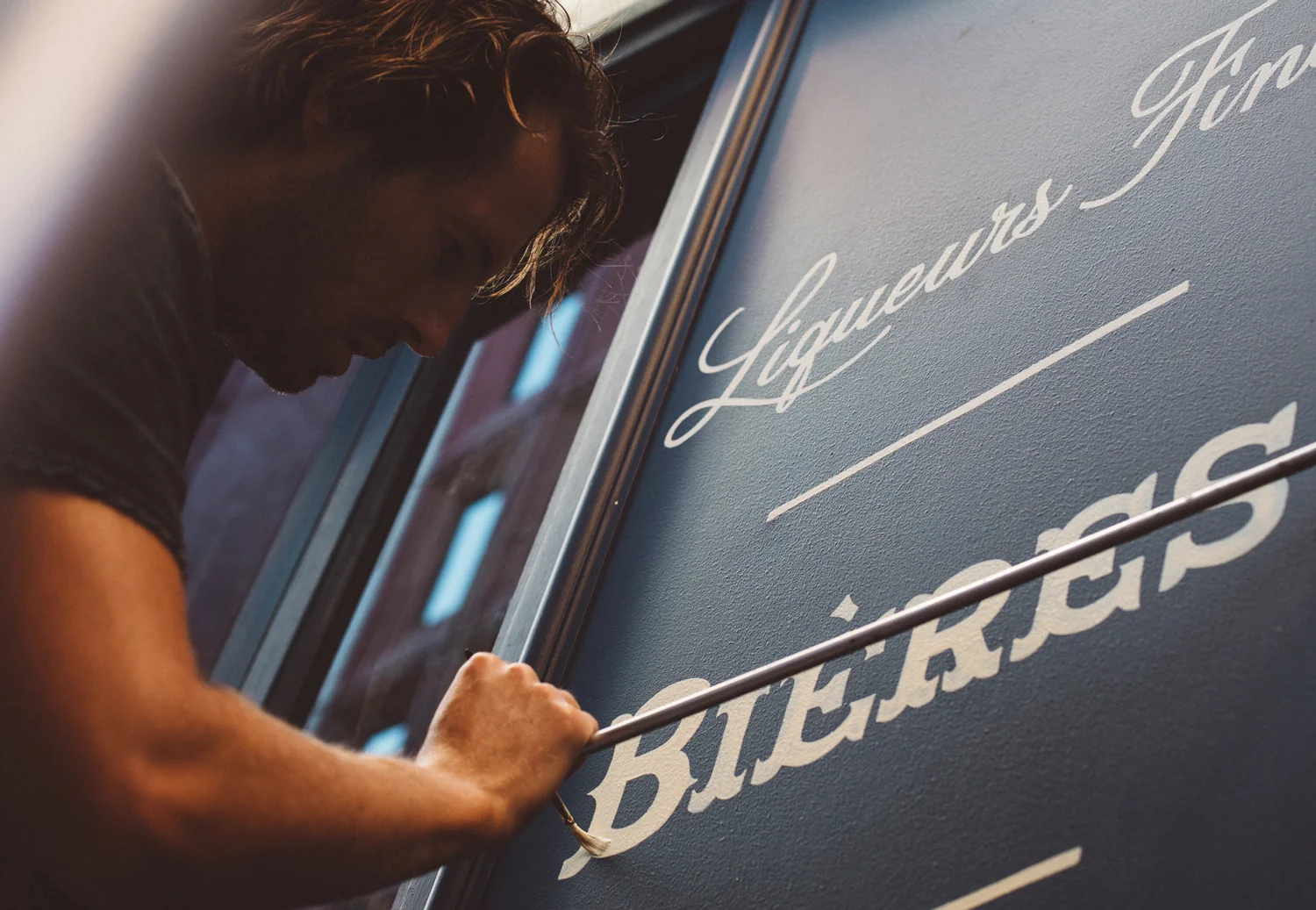 Store front design and sign-painting for La Buvette bar