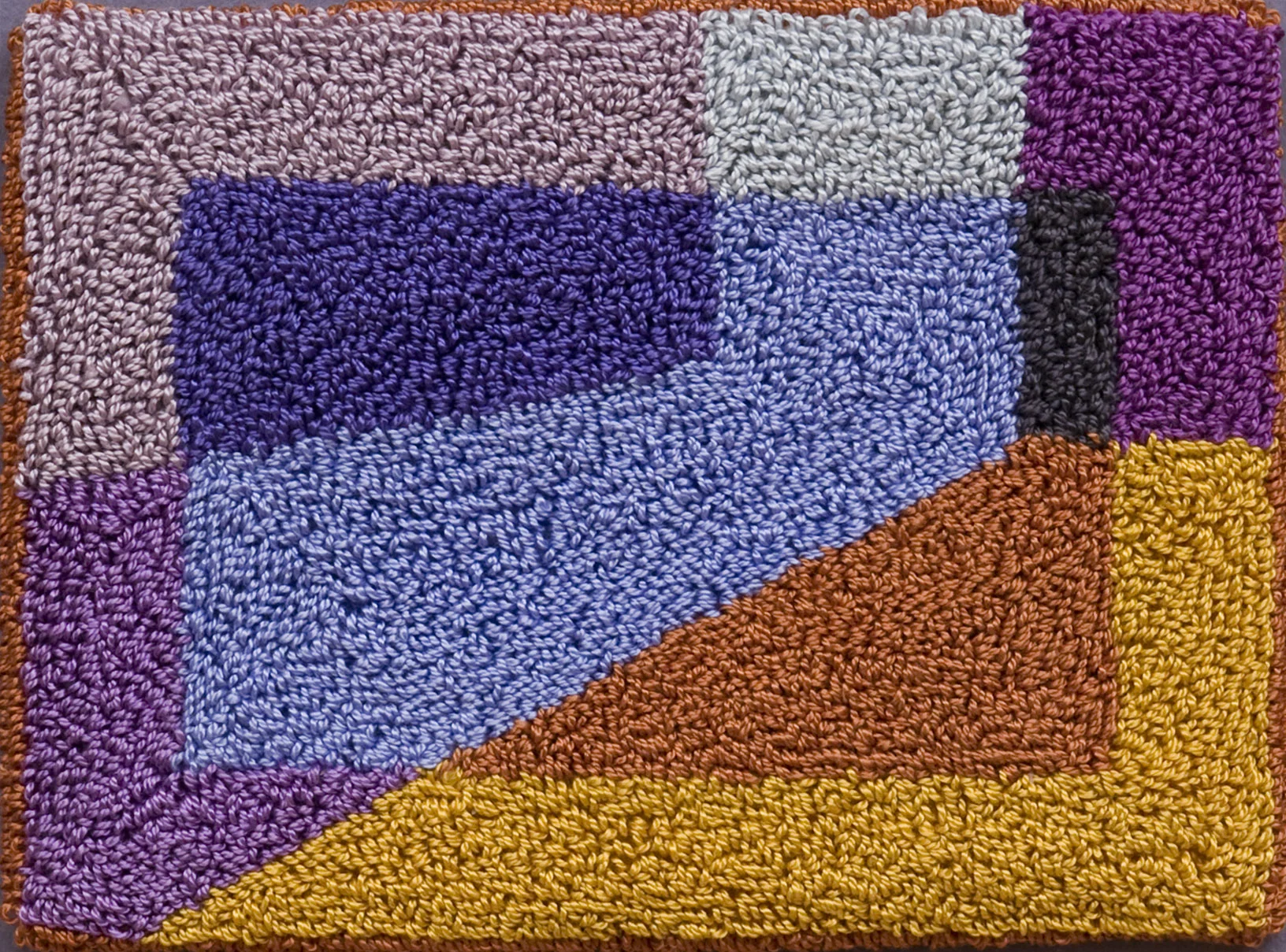 400-6. The Geometer's Hand 12, 4"x6", hand needlepunched on monks cloth, framed 8"x10"