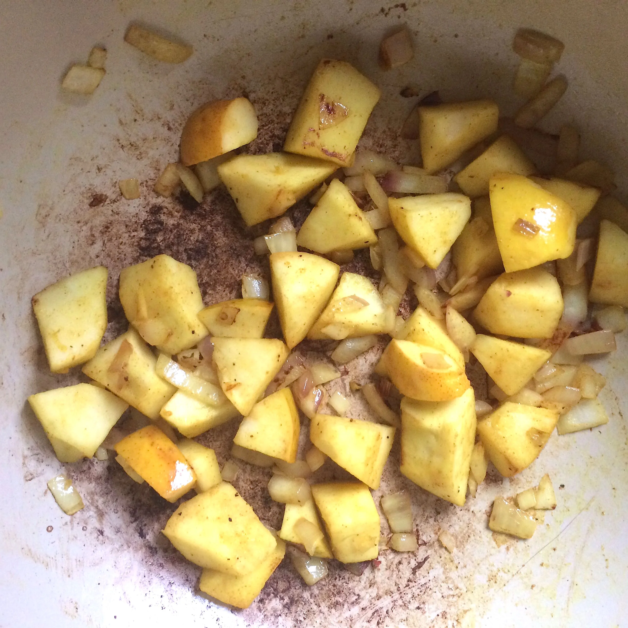 Browning the onions with apples, and little curry until a little caramelization is achieved.