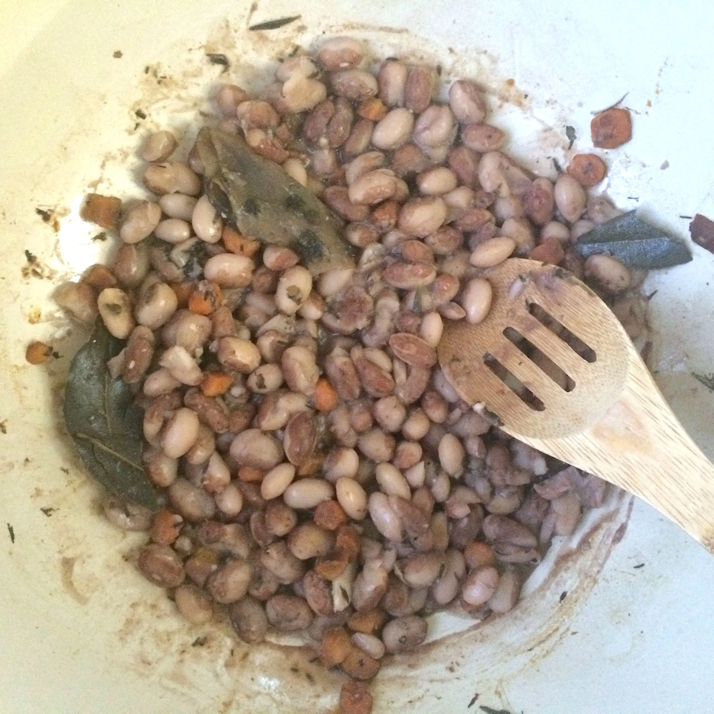 Beans almost fully cooked. A water check showed they needed a little more liquid to finish cooking.