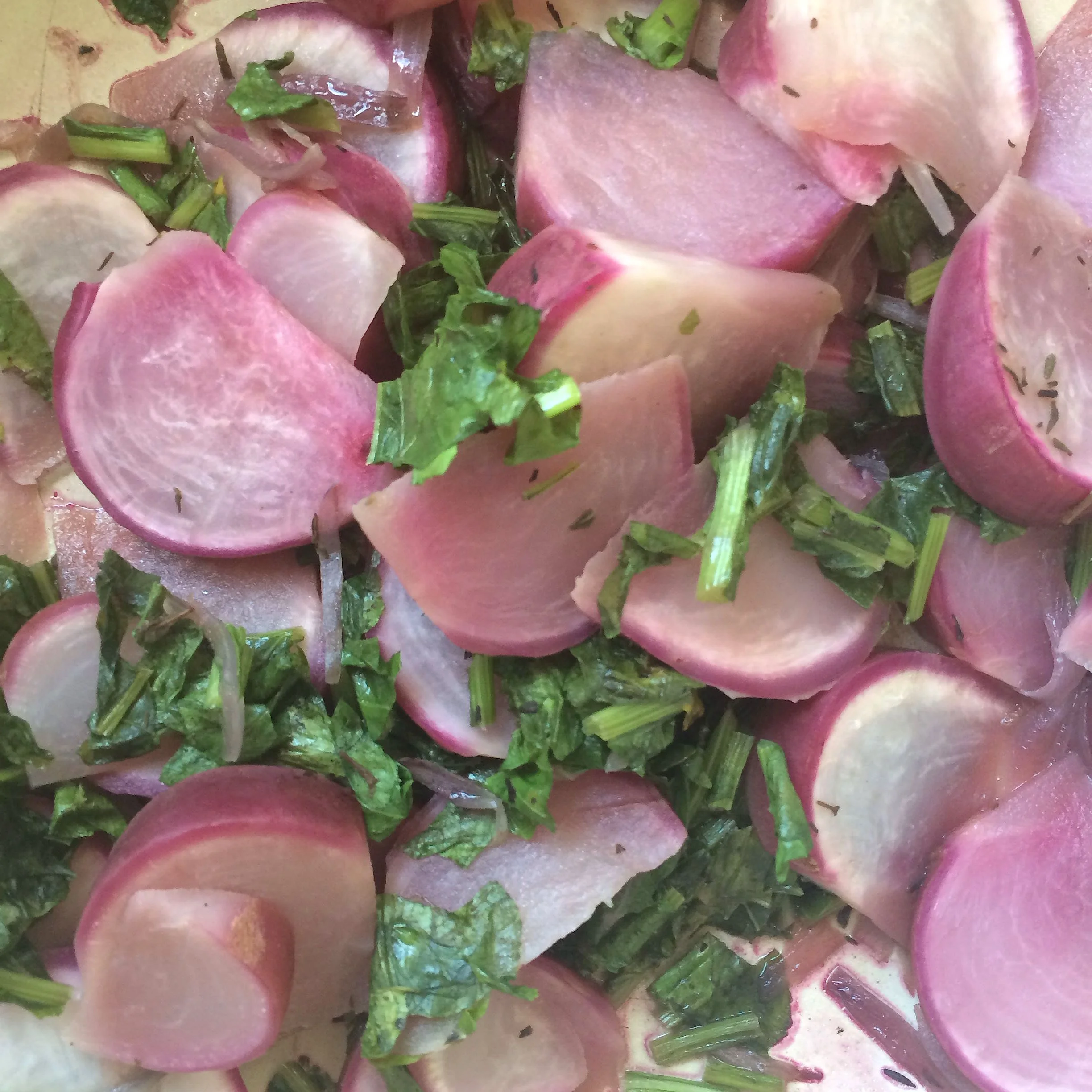 Scarlet turnips braised with their greens which are tasty and edible (no waste :))