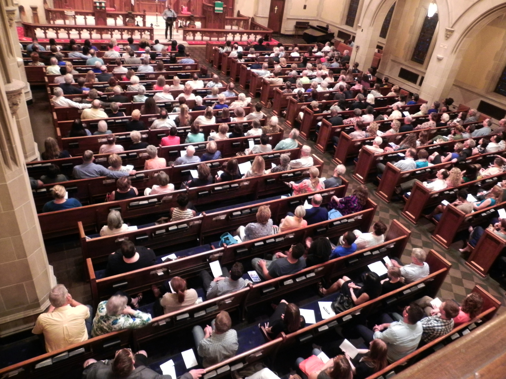Around 400 people gathered for a vigil led by St. Johns' UMC and hosted by St. Paul's UMC