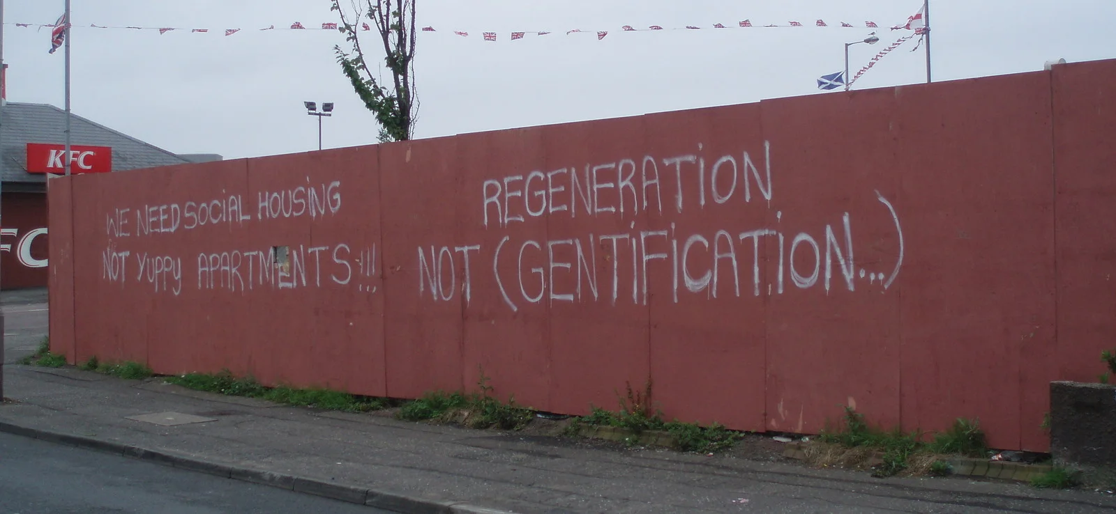 Graffiti_fighting_gentrification_on_the_Shankhill_Road_(2762490009).jpg