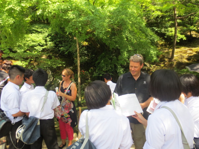 Japanese students learning English interviewed us in the temple garden