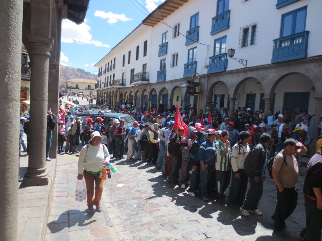 People, mainly men, were marching in to the square