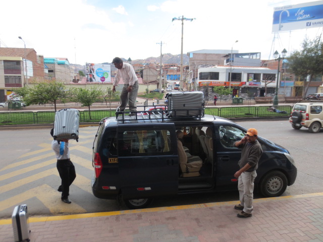 Leaving Cusco - our taxi driver stacked the bags on the roof of the car