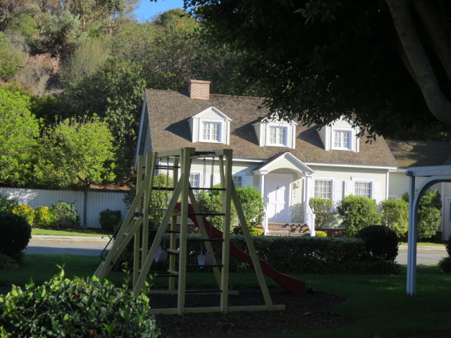 This street was just "too real" with a playground in the middle...