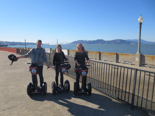 And in front of the Golden Gate bridge - but helmets really should stay on :-)  We promised our guide we would not tell :-)