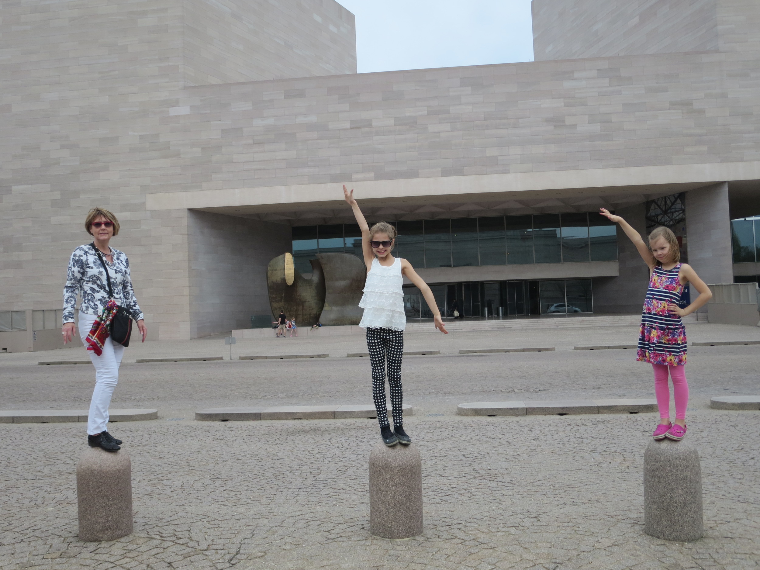 The girls had to try to out-do the boys. In front of the Modern Art Museum that was closed for the time being