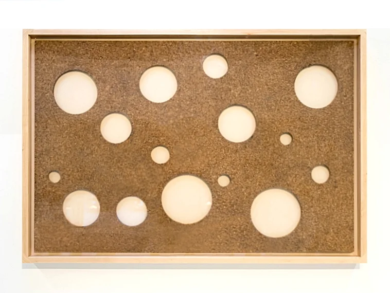 Shaken Antlers, 2015. One of series of 24 unique cork panels, framed.
