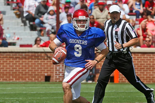 From the dark, Knight rises as Sooners’ QB