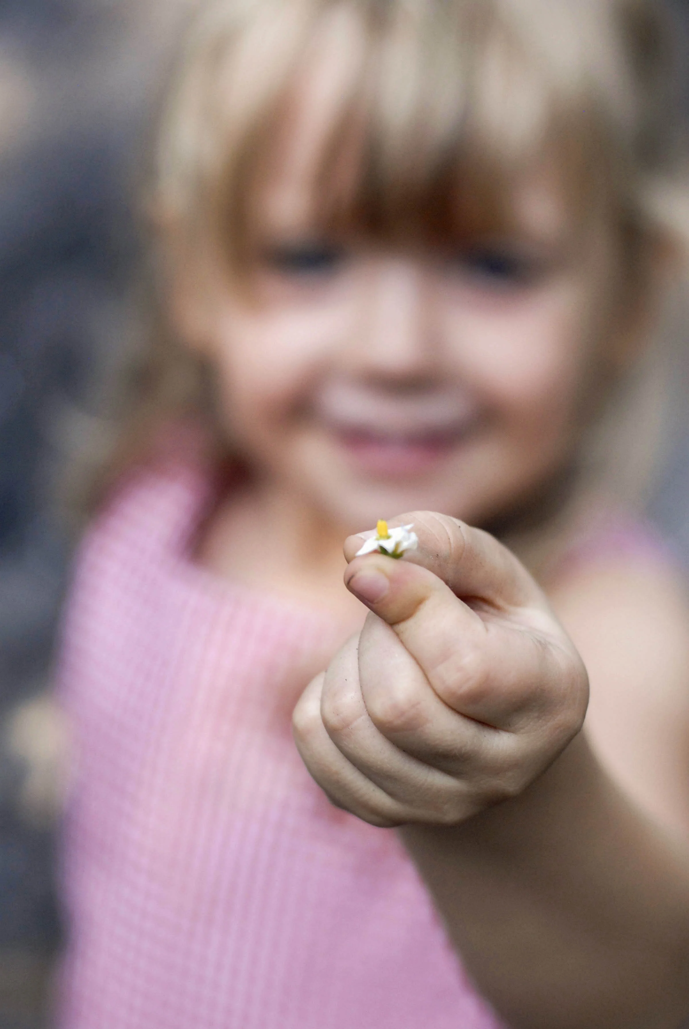 _DSC0102 emma holding flower.jpg
