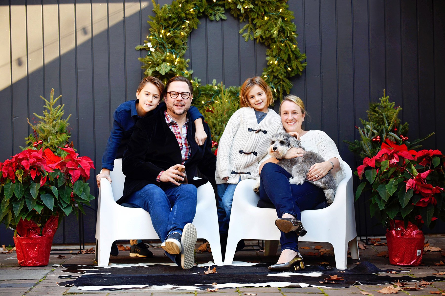 DSC_7787 kristen family outside on chairs web.jpg