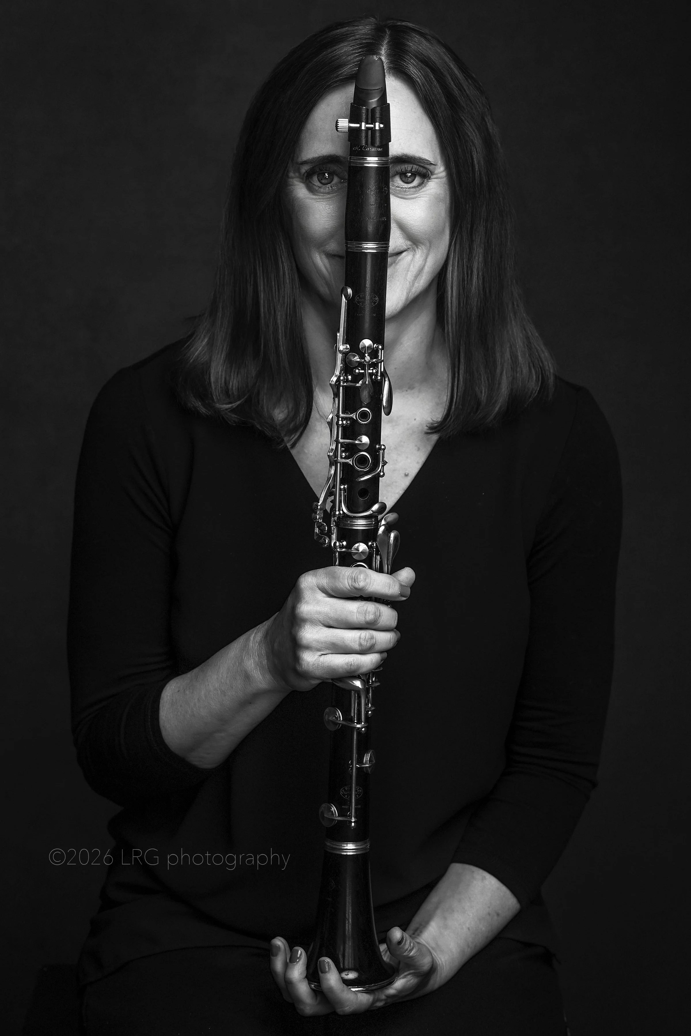 DSC_2105_(2) ginny clarinet over face BW wm_(2).jpg