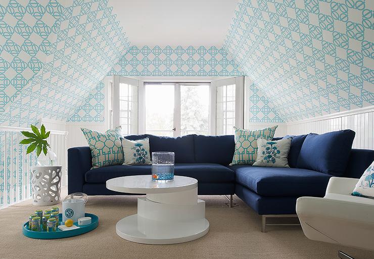 navy-sectional-turquoise-pillows-beadboard-wall-trim.jpg