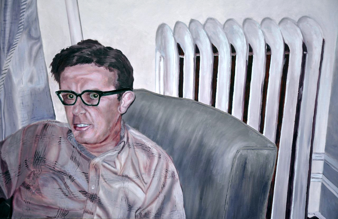 Man on Couch with Glasses