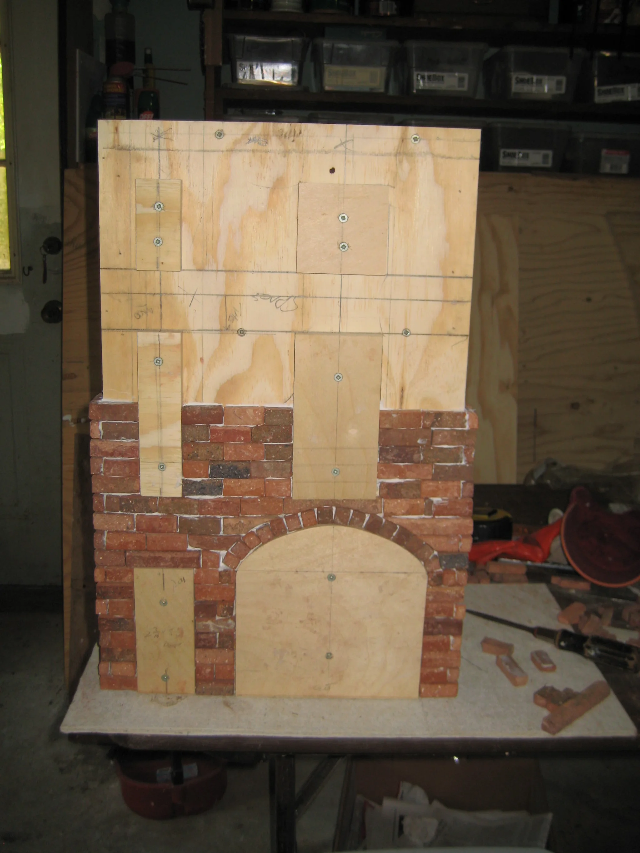 Adding bricks to the front and on the windows