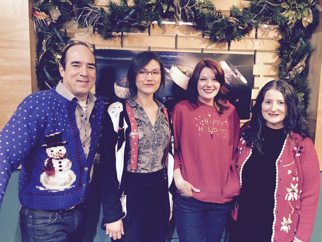 Our staff posing in their 2016 Ugly Sweater Best!