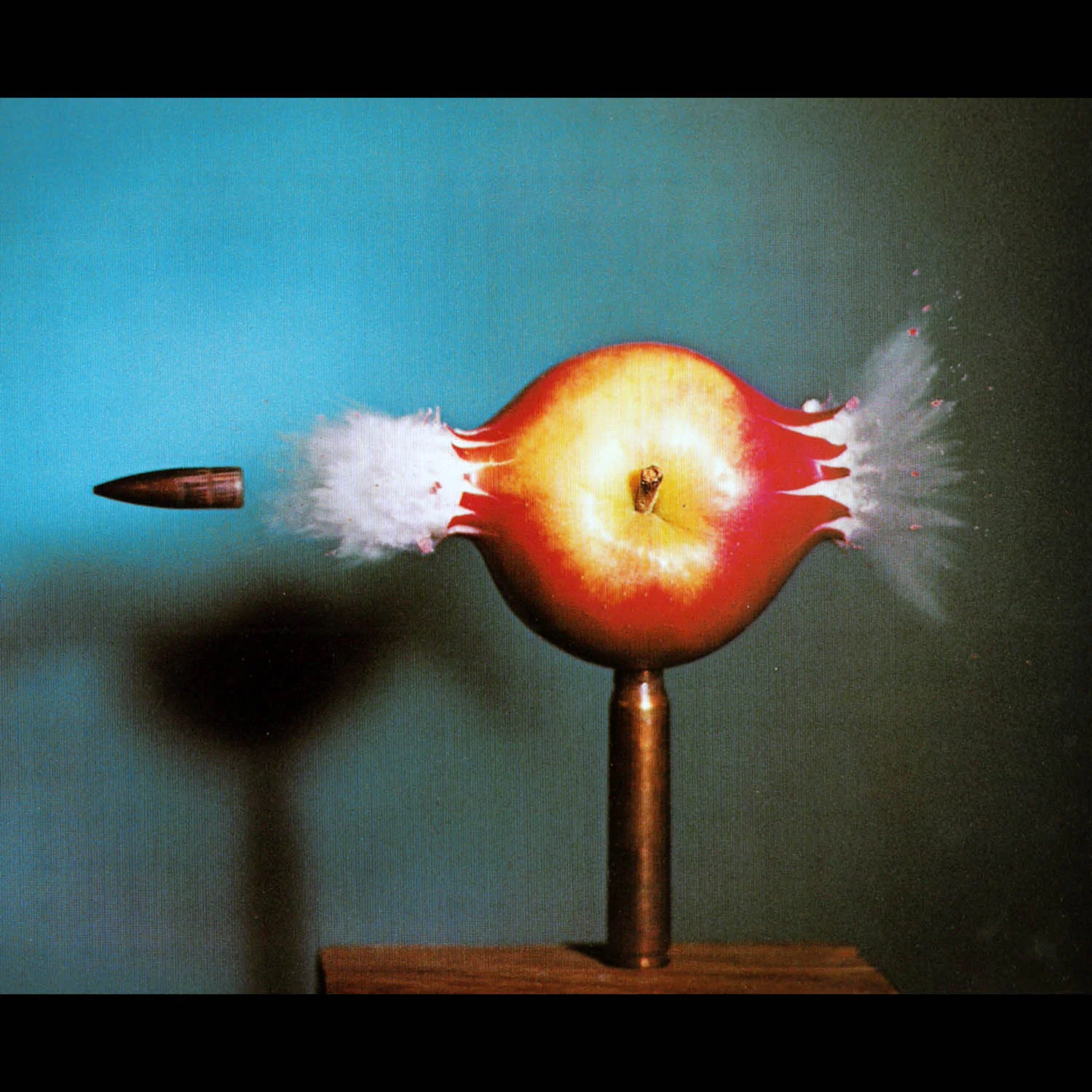 edgerton_bullet through apple.jpg