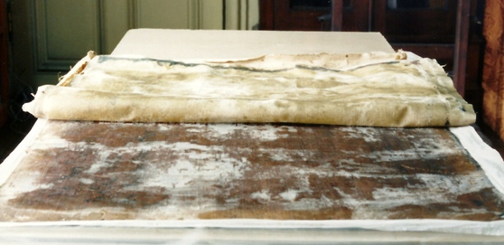 Peeling away the pre-1954 linen lining from original canvas without disturbing the oil paint.