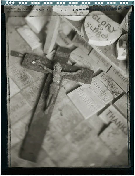 Cross on floor after the flood, St. Roch cemetery chapel, NOLA