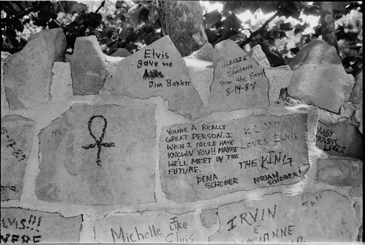 Graffitied wall outside Graceland.
