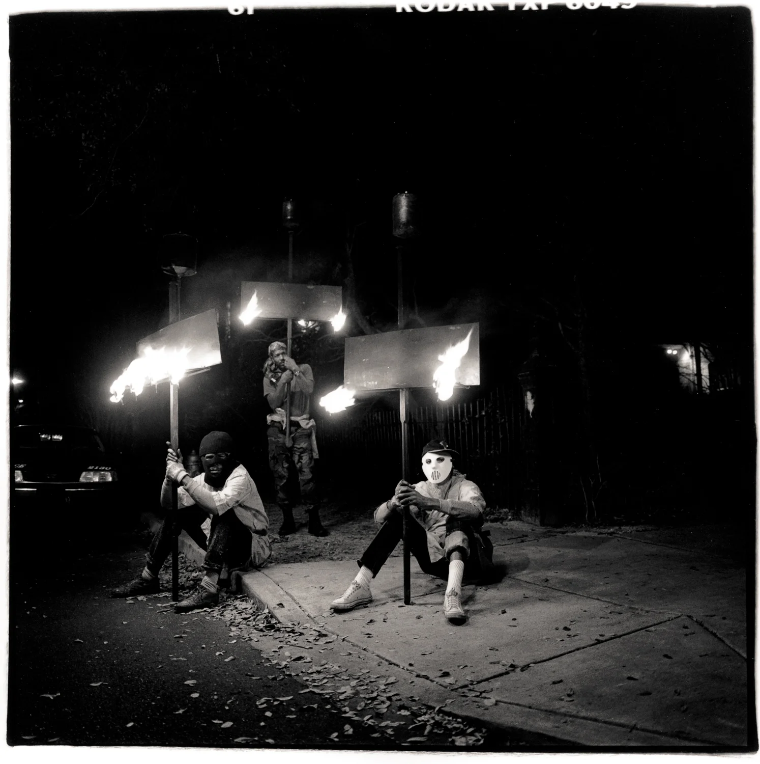 Masked Flambeaux carriers, New Orleans, LA 1995