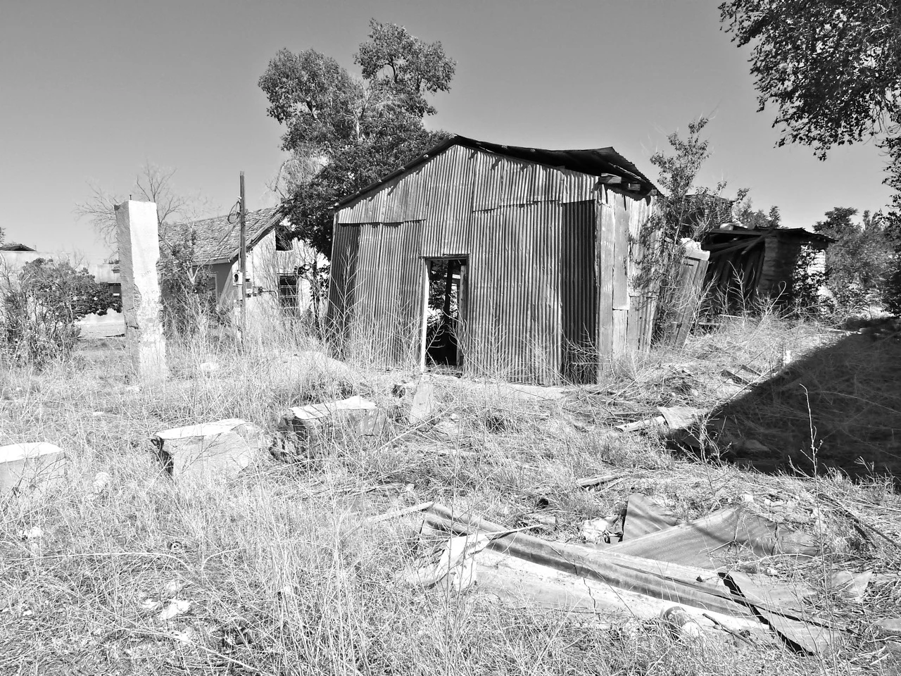 23 June 2012: This is right after we signed on the dotted line and pushed over our paperwork. Our lot, measuring 53' x 125', came with this adobe bulwark, caving in like an abandoned shipwreck.