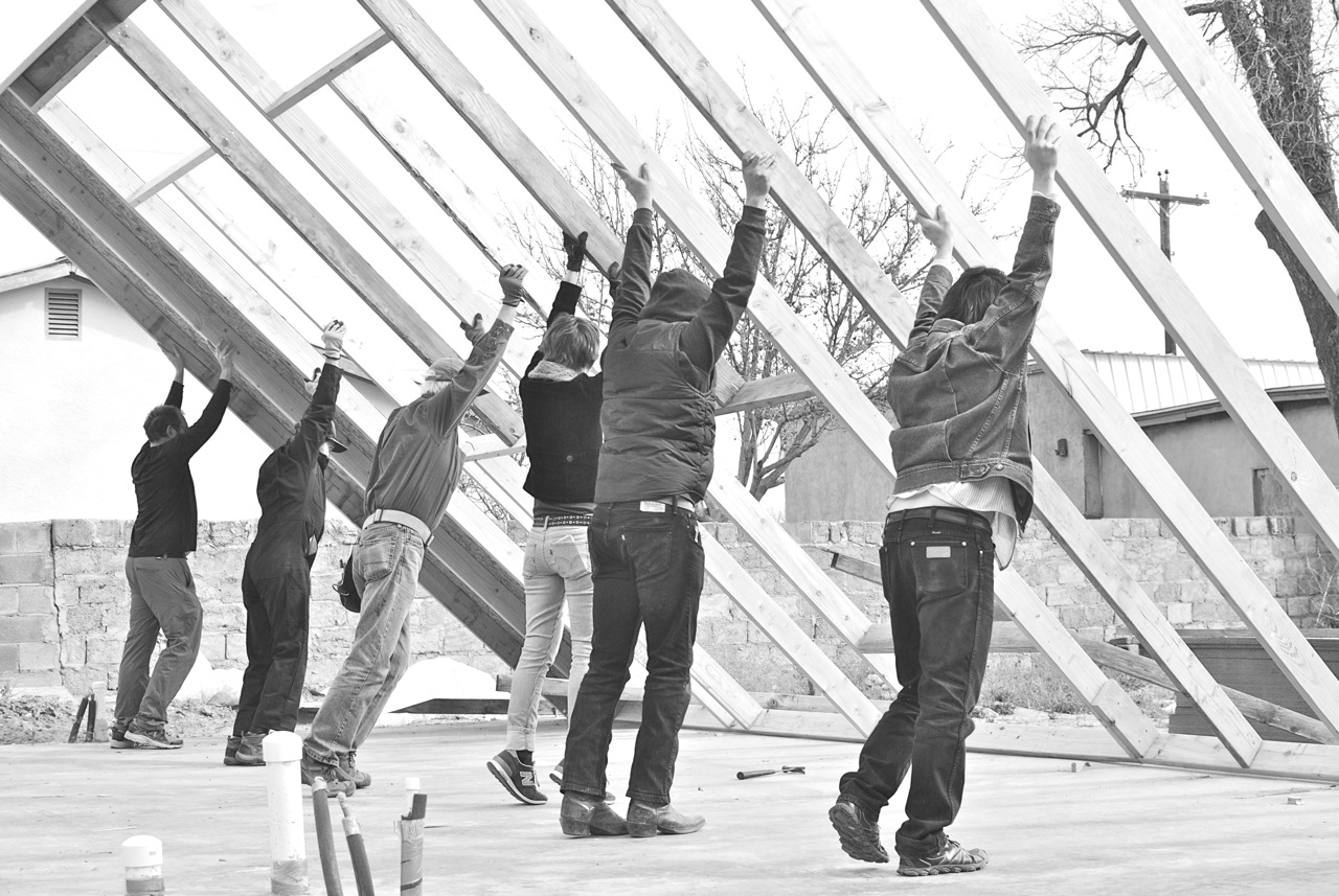 22 December 2014: To tip up our highest wall (16ft, south-facing) a handful of friends came out to help, including Camp, Jean and Richard (our neighbors), Riley, and Ross. This photo was taken by Martha Schnee (originally in color).