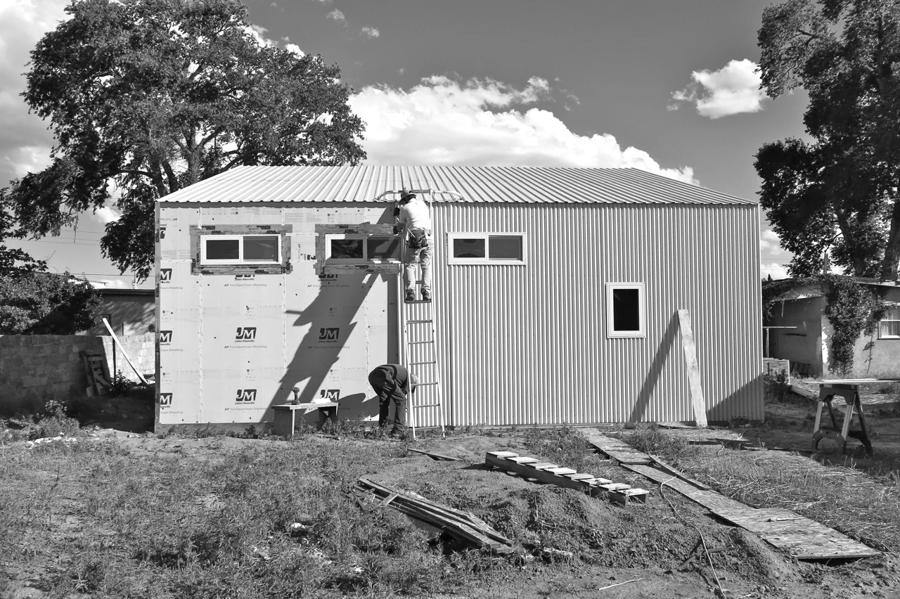 21-22 May 2015: Siding on the north wall.