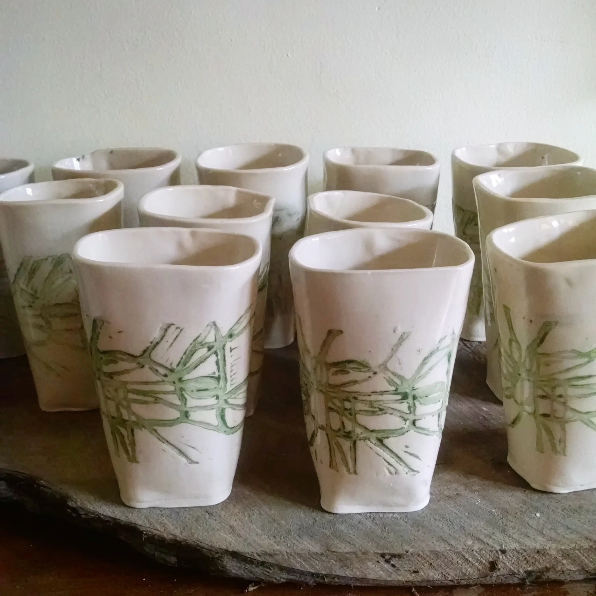 Rustic tumblers, hand-built, impressed with hand-carved Memphis map block. 4x2x6" 2016
