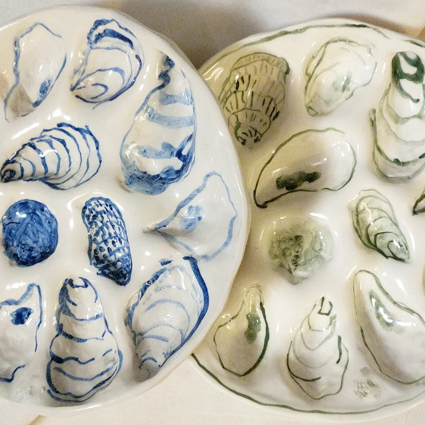 handmade oyster plates are built from porcelain slabs formed over a handmade bisque mold. Each oyster is based on an actual oyster shell from Downeast Maine, North Carolina’s Outer Banks, and the Mississippi Gulf Coast.