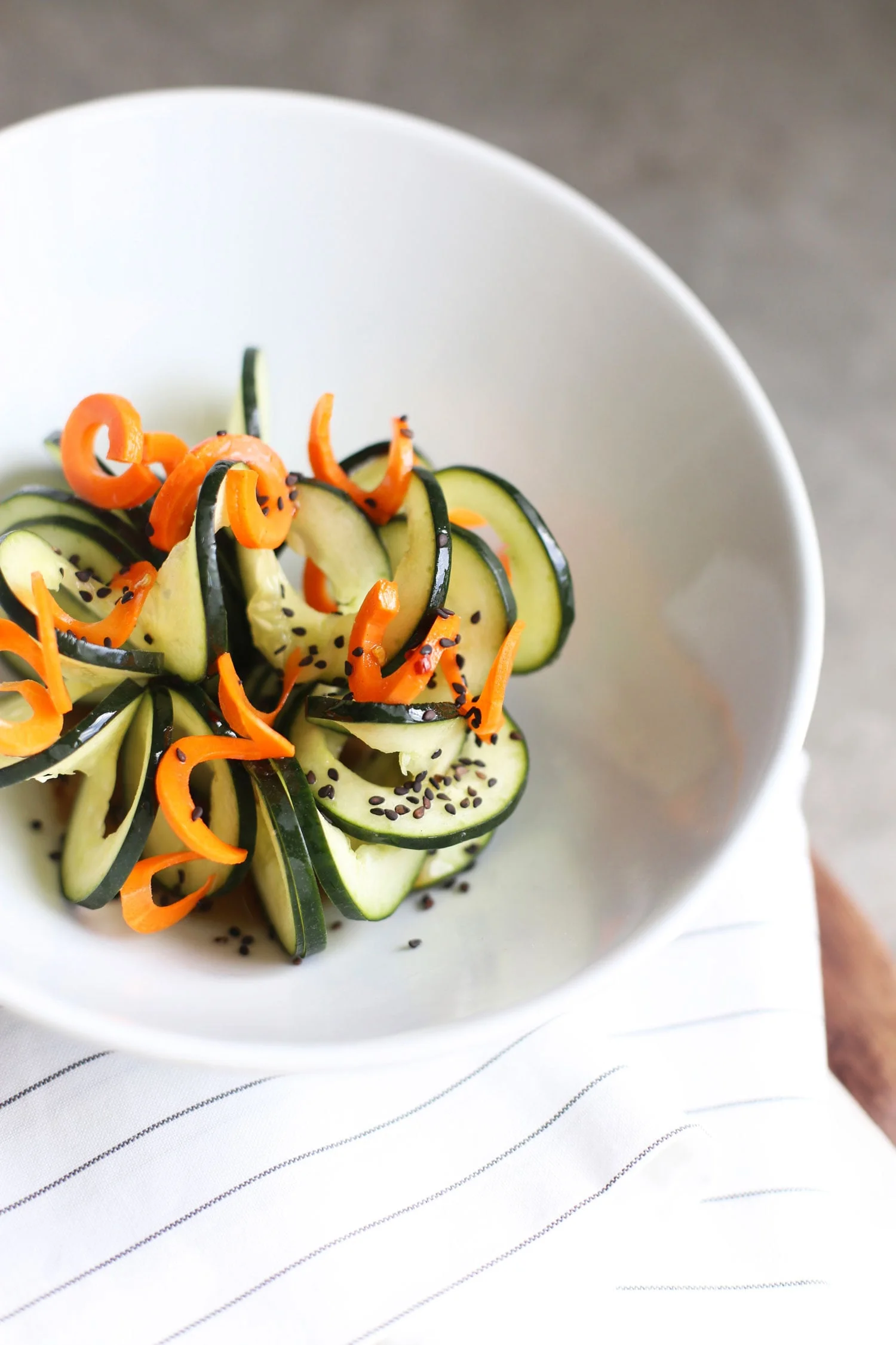 superfood recipes - spiralized cucumber and pickled carrot salad with sesame honey dressing