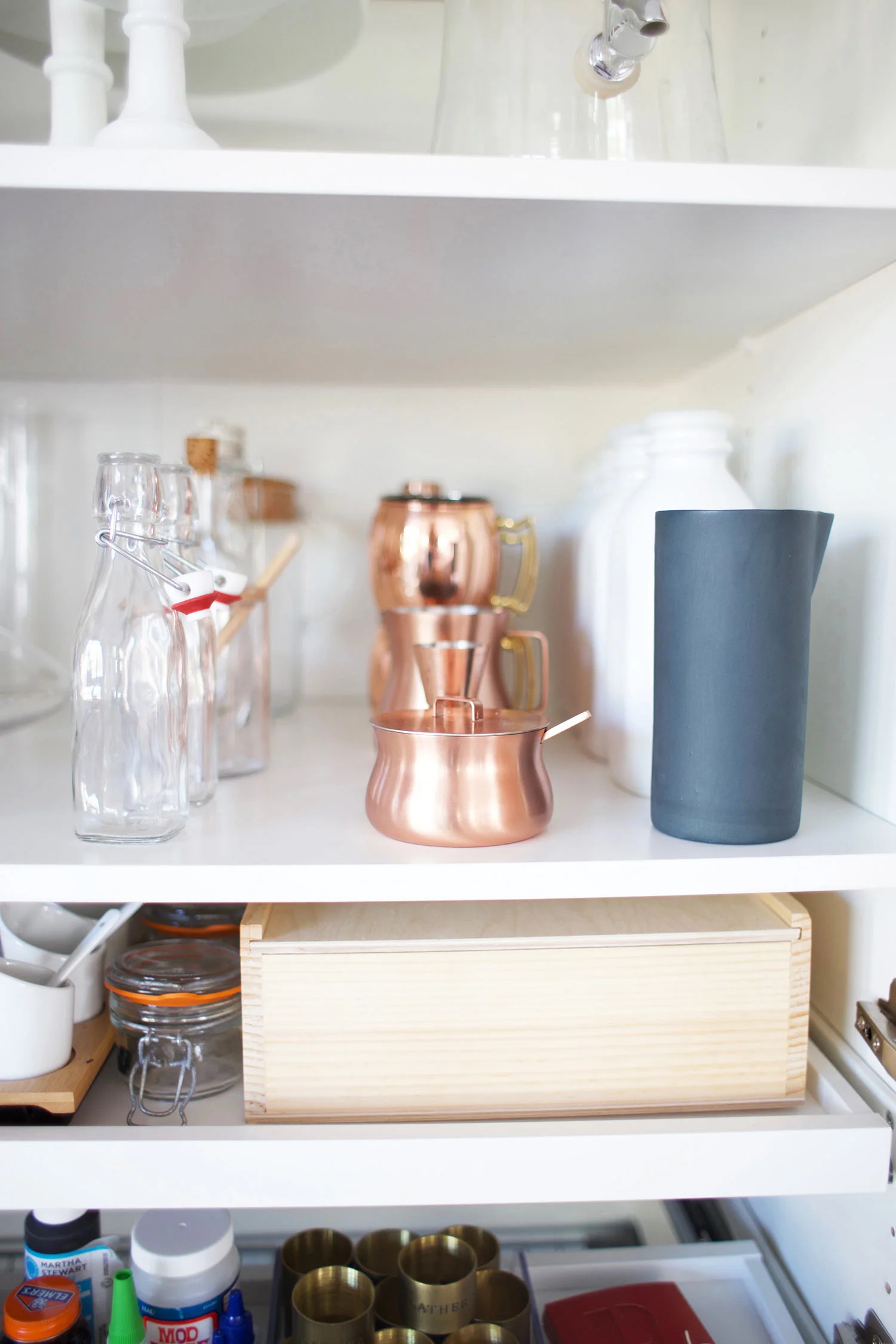 organized blog props on a shelf
