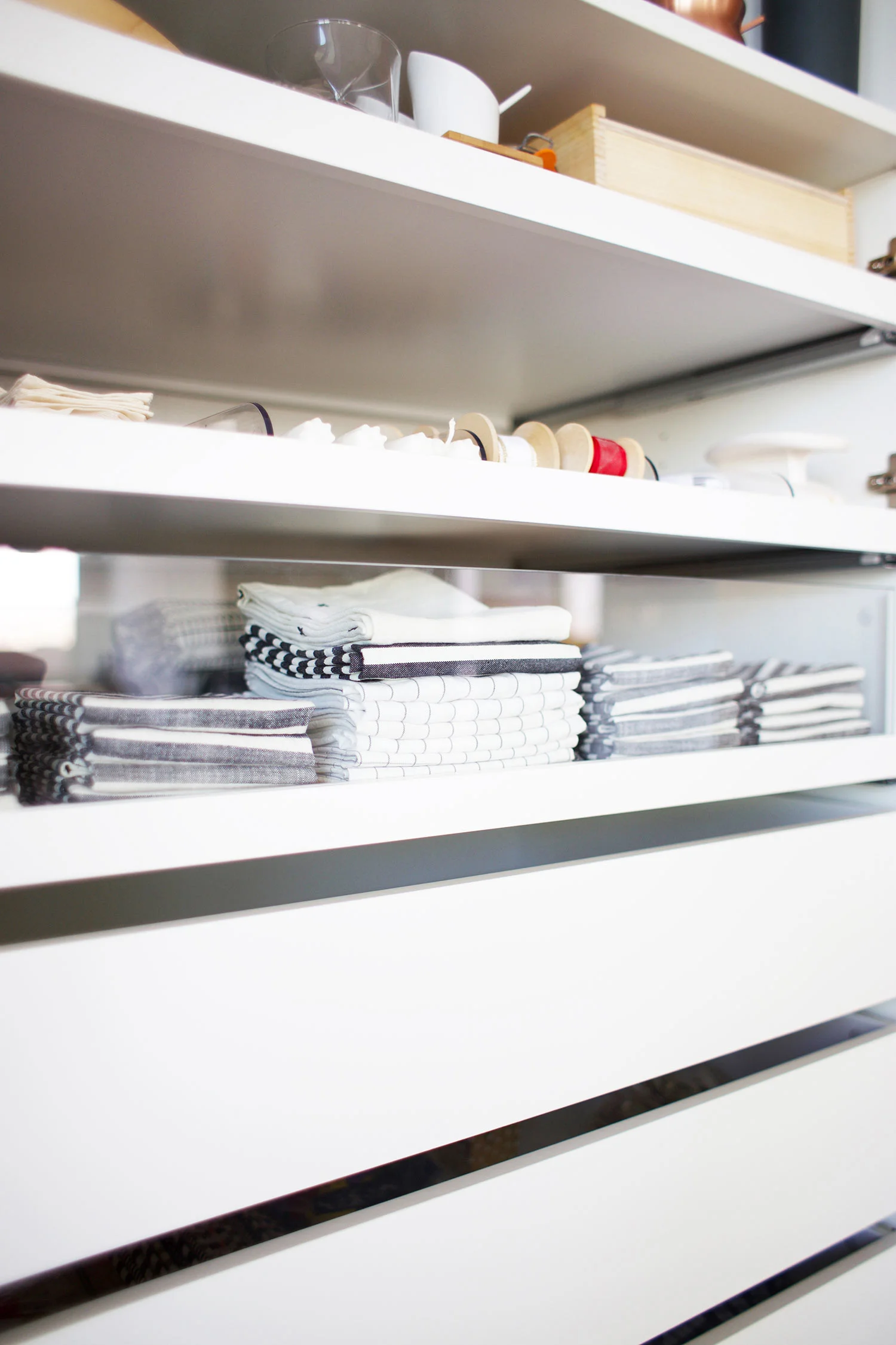 clear front drawer with textiles inside