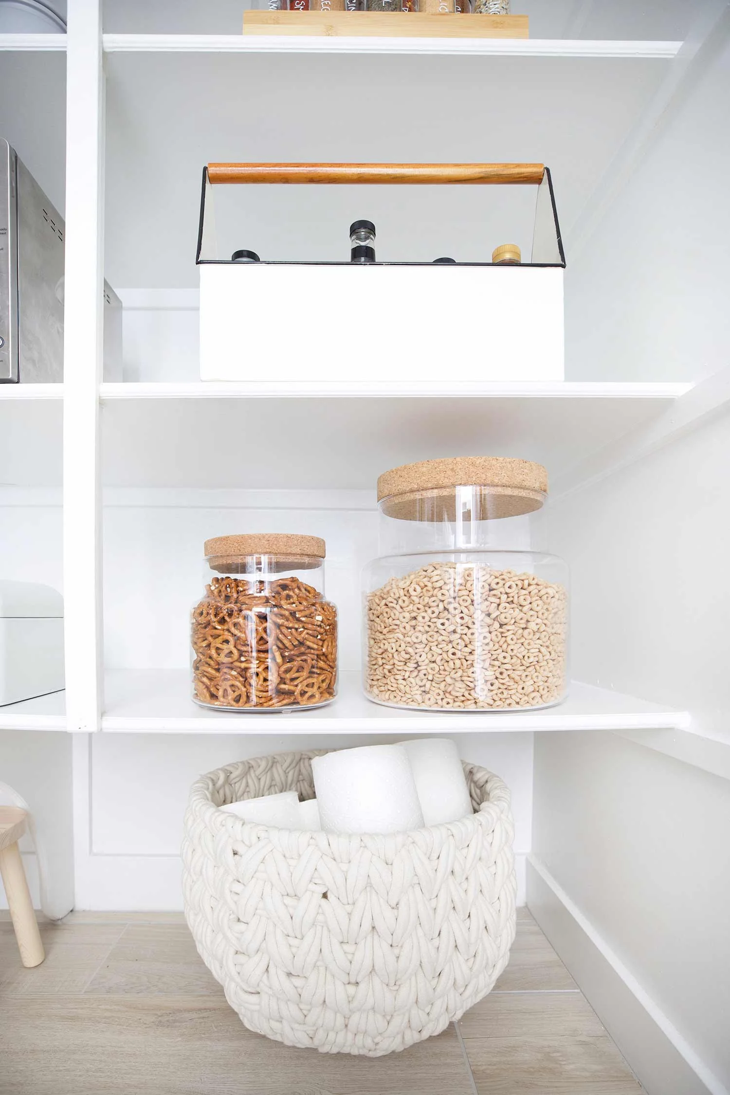 large snack jars in organized pantry
